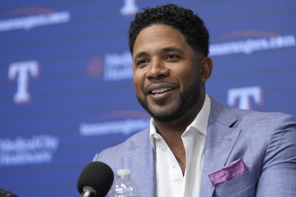 Texas Rangers' Elvis Andrus smiles during a news conference before the baseball game between the Rangers and the Los Angeles Angels, Friday, Sept. 6, 2024, in Arlington, Texas. Andrus announced his retirement as an active Texas Rangers player after playing the first 12 seasons of his 15-year Major League career in Arlington. (AP Photo/LM Otero)