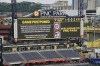The scoreboard at PNC Park announces the postponement of a baseball game between the Pittsburgh Pirates and the Washington Nationals in Pittsburgh, Friday, Sept. 6, 2024. It will be played as part of a split doubleheader beginning a 1:35p Saturday, Sept 7, 2024. (AP Photo/Gene J. Puskar)