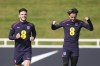 England's Jack Grealish and Declan Rice during a training session a training session at St George's Park, Burton-on-Trent, Britain, Friday Sept. 6, 2024. (Joe Giddens/PA via AP)
