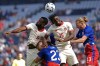 Canada forward Cyle Larin (9) and defender Moïse Bombito (15) compete for the ball with United States defenders Tim Ream (13) and Kristoffer Lund (23) during the first half of an international friendly soccer game, Saturday, Sept. 7, 2024, in Kansas City, Mo. THE CANADIAN PRESS/AP-Charlie Riedel