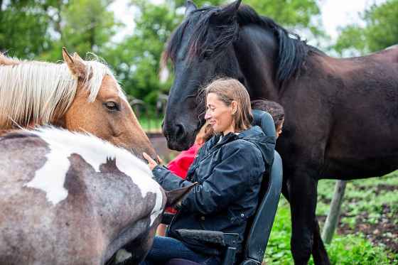Alyssa Selman with her horses on her property west of Carman. (Mikaela MacKenzie / Free Press)