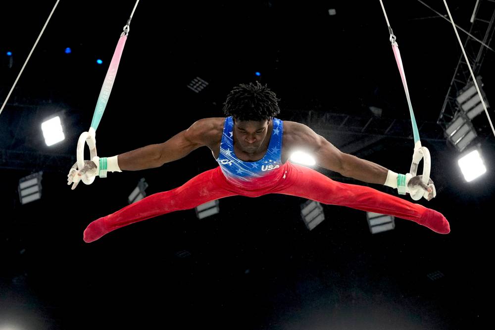 Abbie Parr / The Associated Press
Frederick Richard of the U.S. performs on the rings during the men’s artistic gymnastics all-around finals in Paris, Wednesday.