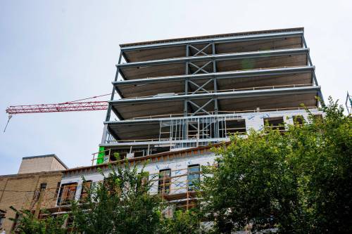 NIC ADAM / FREE PRESS
                                The outside of Concord Properties&rsquo; new 10-storey, $30 million, mixed used building, pictured on Friday, on the site of a former surface parking lot in the Exchange District. This is where Concord&rsquo;s new office will be once completed. 240802 - Friday, August 02, 2024. Reporter: Martin Cash