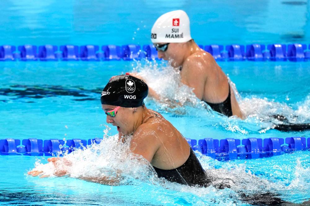 MARTIN MEISSNER / ASSOCIATED PRESS FILES
Kelsey Wog competes during an Olympics heat in the women’s 200-meter breaststroke July 31.