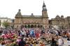Darren Staples / The Associated Press
                                A vigil for British stabbing victims
