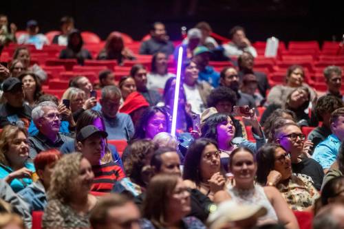 BROOK JONES / FREE PRESS An audience member is pictured with a Star Wars Lightsaber toy.