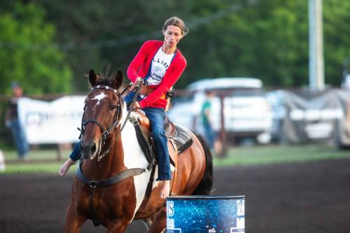 Alyssa Selman competes with her horse, Duke &mdash; the first time for both mount and rider &mdash; in the Denim & Dust Barrel Racing Series event in Carman last Tuesday. (Mikaela Mackenzie) / Free Press)