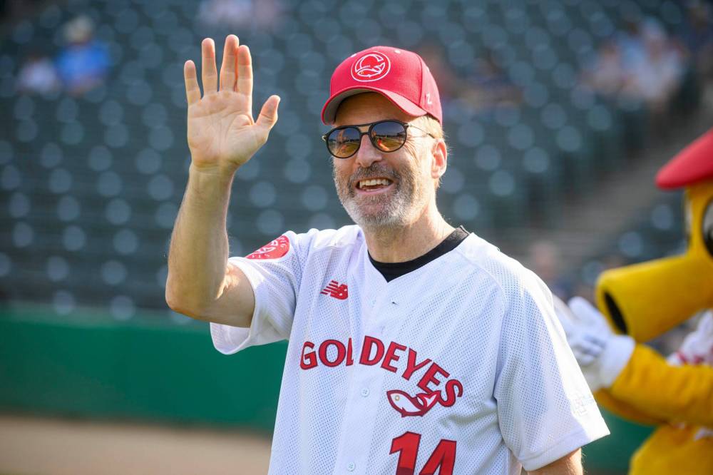 MIKE SUDOMA / FREE PRESS
Actor Bob Odenkirk, in town filming his latest movie, took time out to throw a ceremonial pitch.