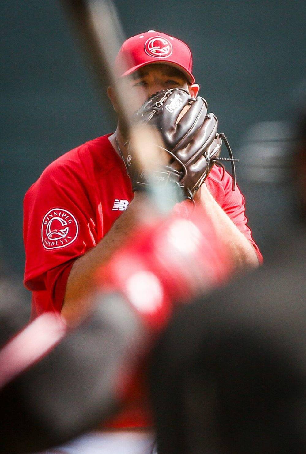 Goldeyes pitcher Mitchell Lambson throws against the Explorers Sunday. (John Woods / Free Press)