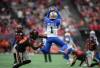 Winnipeg Blue Bombers’ Deatrick Nichols (1) intercepts a pass intended for B.C. Lions’ Alexander Hollins (13) during the first half of a CFL football game, in Vancouver, B.C., Sunday, Aug. 18, 2024. (Darryl Dyck / The Canadian Press)