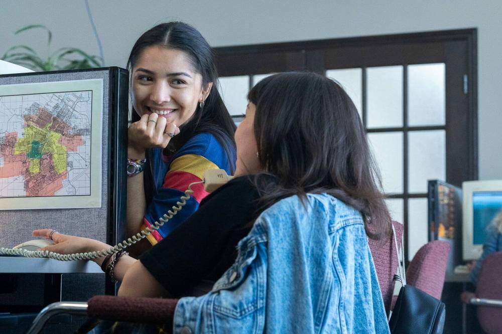 Jackie Brown photo
                                Violet (Leenah Robinson) smiles at at Harley (Victoria Gwendoline) in the call centre.