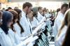 MIKAELA MACKENZIE / FREE PRESS
                                The newest University of Manitoba medical class recites the physicians’ pledge in a ceremony at the Max Rady College of Medicine on Wednesday.