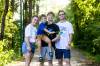 MIKAELA MACKENZIE / FREE PRESS
                                Olesia (left), Danylo (six), Bohdan (17), and Nazariy Chychkevych. Nazariy organized the Ukrainian Unity Run at The Forks Saturday to raise money for the 12th Azov Special Forces Brigad.