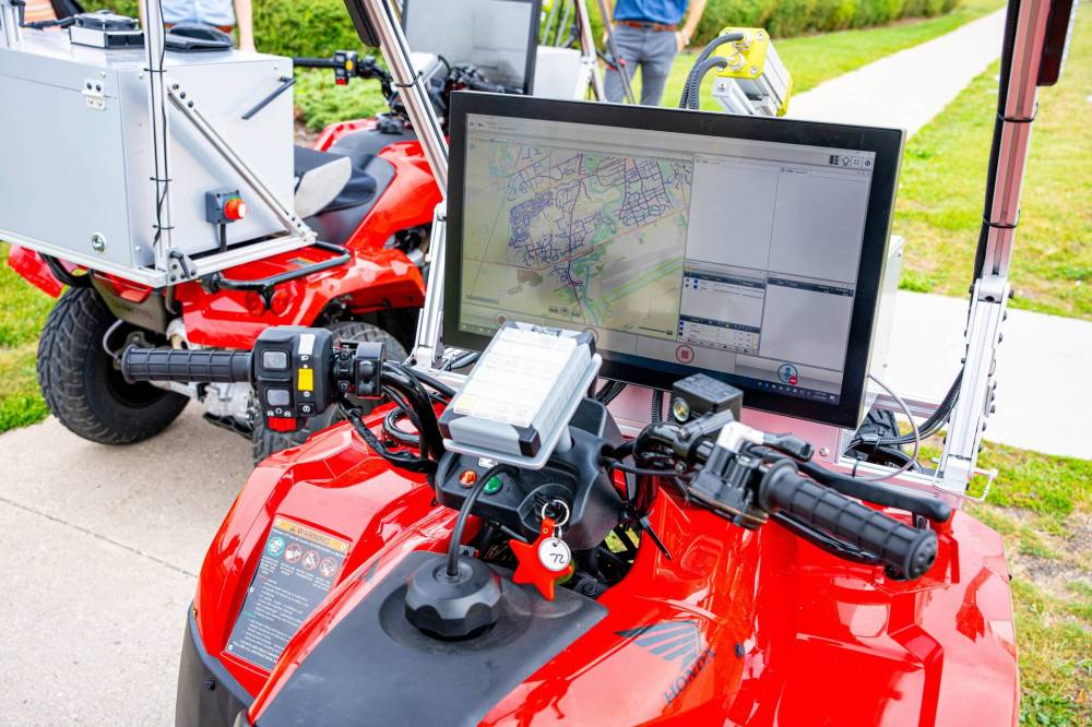 NIC ADAM / FREE PRESS
The city’s four new sidewalk surface testing vehicles will be used to snap images of route conditions on Winnipeg’s 3,200 kilometres of sidewalks and pathways to help pinpoint the most needed repairs.