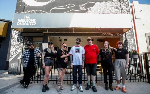 JOHN WOODS / FREE PRESS Handsome Daughter staff from left, Jay Evaristo, owner, Karlee Liljegren, bartender, Jessa Johnson, market coordinator, Jessee Kowalski, co-GM, Mike O&rsquo;Connell, co-GM, Chelsa Schioler, bartender, and Ryan Boyes, cafe consultantphotographed outside the restaurant in Winnipeg Monday, July 8, 2024. Reporter: ben
                                JOHN WOODS / FREE PRESS
                                Handsome Daughter staff, from left: owner Jay Evaristo, bartender Karlee Liljegren, marketing co-ordinator Jessa Johnson, co-GMs Jessee Kowalski and Mike O&rsquo;Connell, bartender Chelsa Schioler, and café consultant Ryan Boyes.