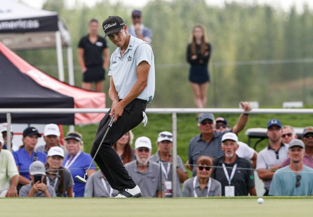 John Keefer encourages his putt closer to the 18th hole Sunday during the final round of the Manitoba Open at Southwood Golf & Country Club. (John Woods / Free Press)