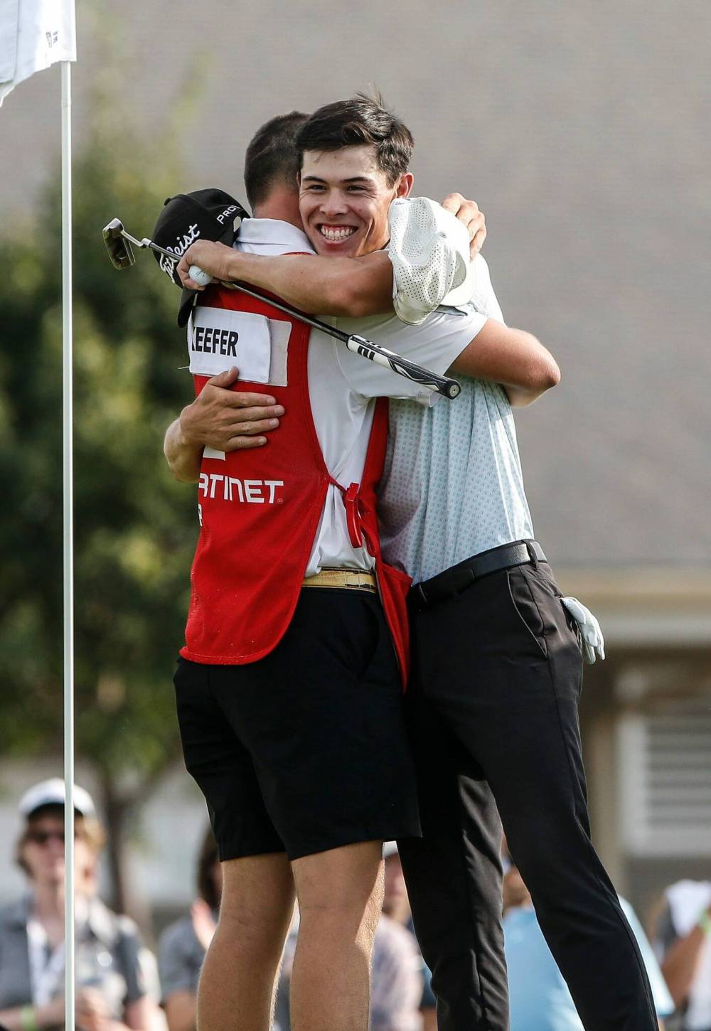 John Keefer hugs his caddie after defeating Neil Shipley to win the Open. (John Woods / Free Press)