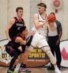 JASON HALSTEAD / FREE PRESS FILES
                                University of Winnipeg Wesmen guard Shawn Maranan defends against University of Manitoba Bisons forward Simon Hildebrandt during Canada West university basketball action on Feb. 3, 2023, at Investors Group Athletic Centre at the University of Manitoba.
