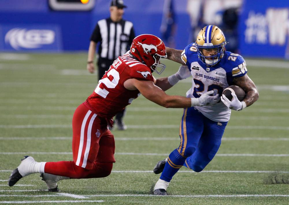 John Woods /THE CANADIAN PRESS files
In addition to his usual workload as a running back, Brady Oliveira has been piling up the yards receiving catches as well.