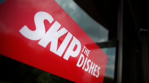 JOHN WOODS / WINNIPEG FREE PRESS
Signs of Skip The Dishes, the food delivery service, stick to restaurant windows in Winnipeg Monday, July 30, 2018. The service provided is having labour issues.