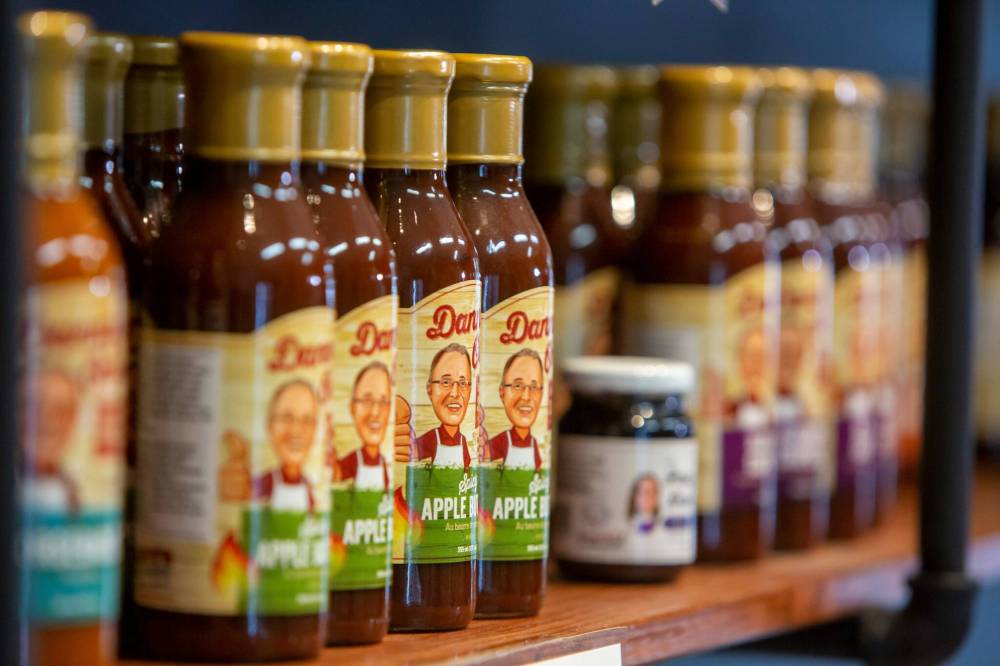 Danny's Own Barbecue Sauce at the family's retail store. The company now offers a range of retail products, including ready-to-eat meals, pastries, soups and sauces. (Brook Jones / Free Press)
