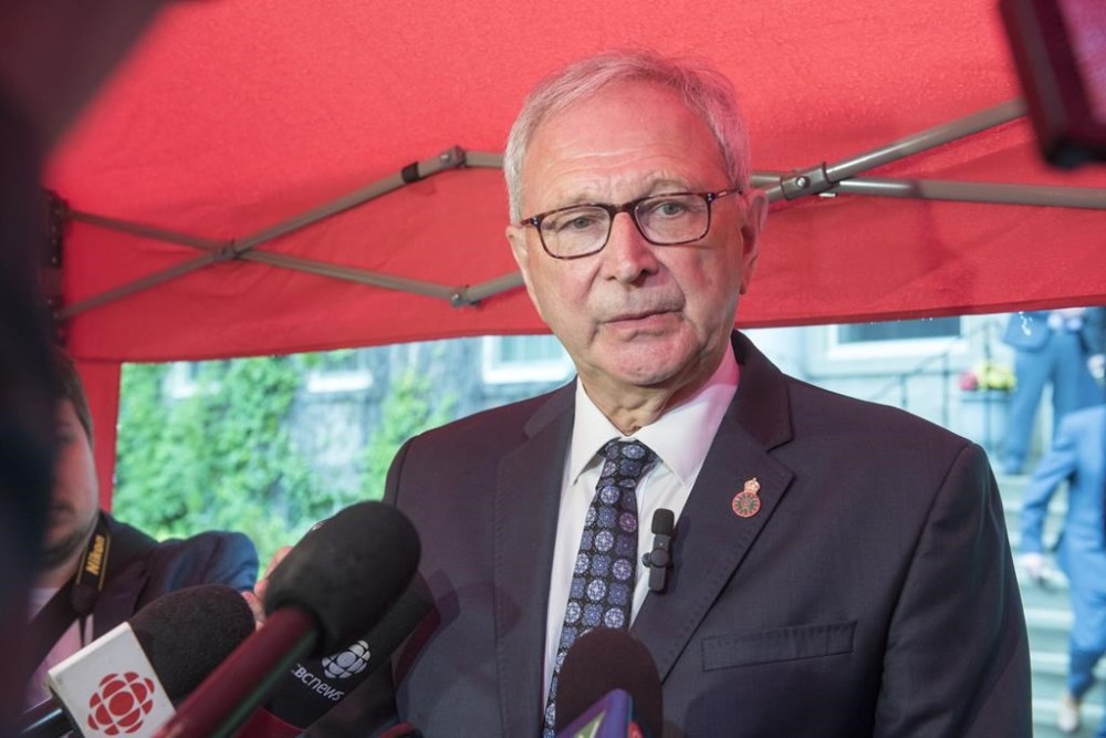 New Brunswick Premier Blaine Higgs speaks to media outside Government House following a cabinet shuffle, in Fredericton, Tuesday, June 27, 2023. THE CANADIAN PRESS/Stephen MacGillivray