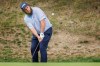 Andrew Johnston hits a shot during the fourth and final round of the European Masters Golf Tournament, in Crans-Montana, Switzerland, Sunday, Sept. 8, 2024. (Valentin Flauraud/Keystone via AP)