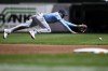 Tampa Bay Rays second baseman Christopher Morel goes after a ball that went for a single by Baltimore Orioles' Gunnar Henderson during the first inning of a baseball game, Sunday, Sept. 8, 2024, in Baltimore. (AP Photo/Nick Wass)