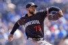 Minnesota Twins starting pitcher Simeon W. Richardson throws during the first inning of a baseball game against the Kansas City Royals Sunday, Sept. 8, 2024, in Kansas City, Mo. (AP Photo/Charlie Riedel)