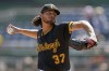 Pittsburgh Pirates starting pitcher Jared Jones delivers during the second inning of a baseball game against the Washington Nationals in Pittsburgh, Sunday, Sept. 8, 2024. (AP Photo/Gene J. Puskar)