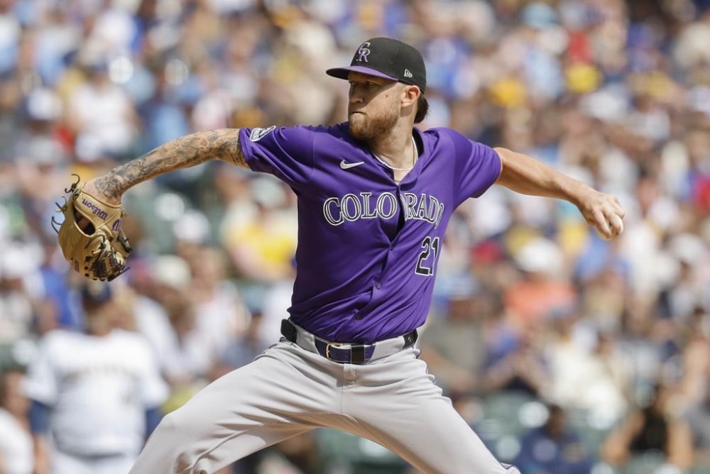 Colorado Rockies pitcher Kyle Freeland throws to the Milwaukee Brewers during the first inning of a baseball game Sunday, Sept. 8, 2024, in Milwaukee. (AP Photo/Jeffrey Phelps)