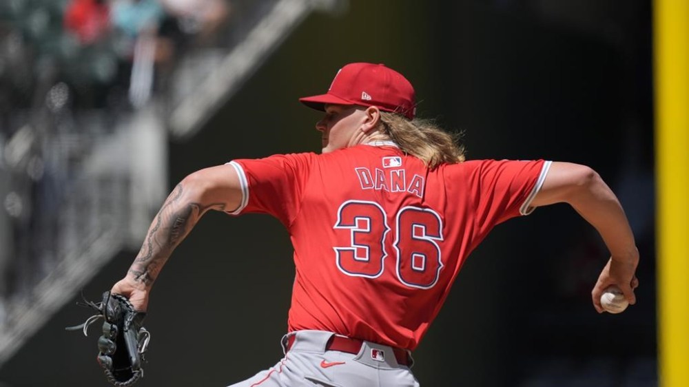 Los Angeles Angels starting pitcher Caden Dana throws during the first inning of a baseball game against the Texas Rangers, Sunday, Sept. 8, 2024, in Arlington, Texas. (AP Photo/LM Otero)