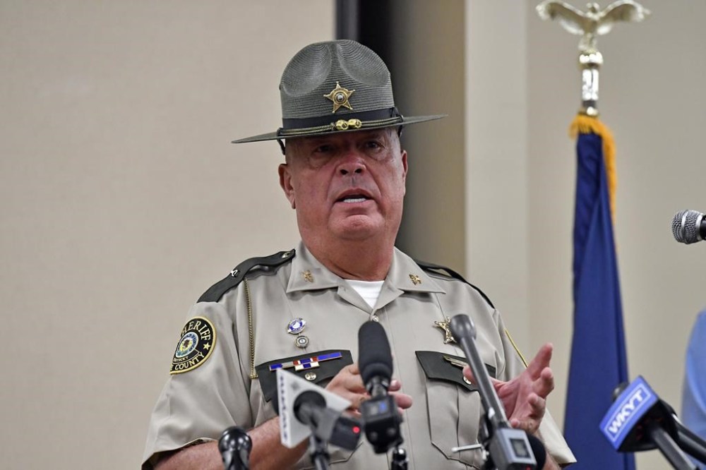 Laurel County sheriff John Root gives an update at the London Community Center in London, Ky., Sunday, Sept. 8, 2024, on the efforts to find the suspect in the Saturday shooting at Interstate 75 near Livingston, Ky. (AP Photo/Timothy D. Easley)