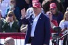 Republican presidential nominee former President Donald Trump waves as he departs a campaign event at Central Wisconsin Airport, Saturday, Sept. 7, 2024, in Mosinee, Wis. (AP Photo/Morry Gash)