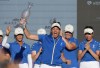 FILE - Europe's Team Captain Suzann Pettersen lifts the trophy after wining the Solheim Cup golf tournament in Finca Cortesin, near Casares, southern Spain, Sunday, Sept. 24, 2023. (AP Photo/Bernat Armangue, File)