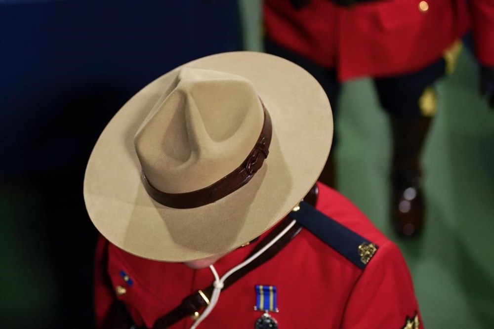 The RCMP says it installed tools on digital devices to covertly collect electronic evidence in 32 cases over a five-year period. A RCMP officer leaves the court at the National Bank Open, in Toronto, Monday, Aug. 12, 2024. THE CANADIAN PRESS/Chris Young