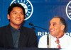 FILE - Yokahama BayStars ace closer Kazuhiro Sasaki, left, and his agent Tony Attanasio, right, address reporters during a press conference at Safeco Field in Seattle, Saturday, Nov. 20, 1999. (AP Photo/Ralph Radford, File)