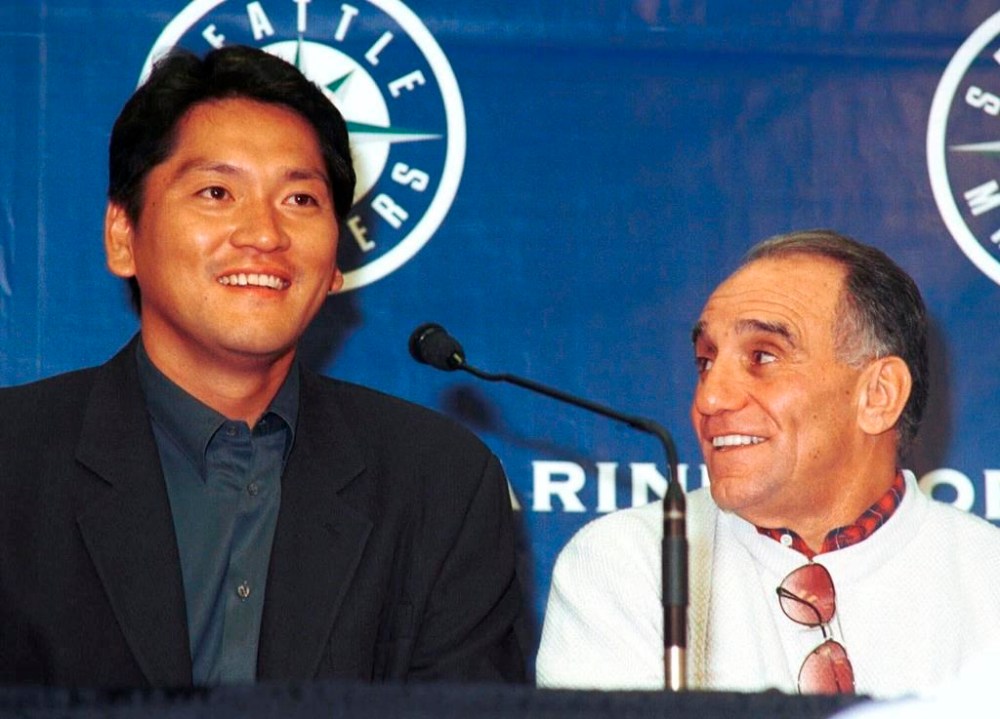 FILE - Yokahama BayStars ace closer Kazuhiro Sasaki, left, and his agent Tony Attanasio, right, address reporters during a press conference at Safeco Field in Seattle, Saturday, Nov. 20, 1999. (AP Photo/Ralph Radford, File)