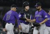 Colorado Rockies pitcher Anthony Molina is pulled by manager Bud Black (10), with catcher Hunter Goodman looking on, during the sixth inning of a baseball game against the Detroit Tigers, Tuesday, Sept. 10, 2024, in Detroit. (AP Photo/Duane Burleson)