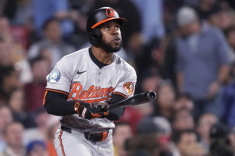 Baltimore Orioles' Cedric Mullins watches the fight of his two-run home run during the third inning of a baseball game against the Boston Red Sox at Fenway Park, Tuesday, Sept. 10, 2024, in Boston. (AP Photo/Charles Krupa)