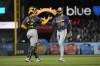 Milwaukee Brewers pitcher Devin Williams (38) is congratulated by catcher William Contreras (24) after a victory against the San Francisco Giants in a baseball game Tuesday, Sept. 10, 2024, in San Francisco. (AP Photo/Tony Avelar)