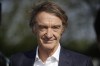 FILE - British billionaire Jim Ratcliffe, the founder of the INEOS Chemicals company, is interviewed by The Associated Press at the Iffley Road Track, in Oxford, England, April 30, 2019. (AP Photo/Matt Dunham, File)