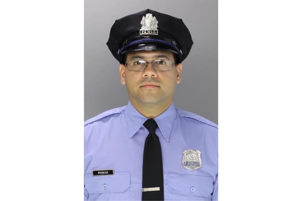 This undated photo provided by the Philadelphia Police Department shows Philadelphia Police Officer Jaime Roman. (Philadelphia Police Department via AP)