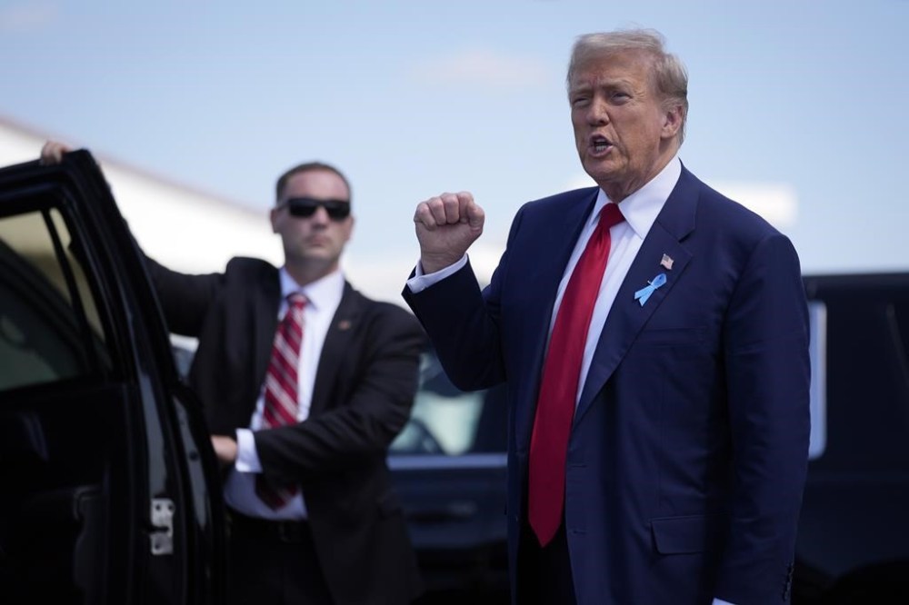 Republican presidential nominee former President Donald Trump arrives in Johnstown, Pa., en route to the Flight 93 Memorial, Wednesday, Sept. 11, 2024. (AP Photo/Matt Rourke)