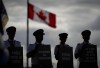 Air Canada pilots air silhouetted while holding signs during an informational picket at Vancouver International Airport in Richmond, B.C., on Tuesday, August 27, 2024.THE CANADIAN PRESS/Darryl Dyck