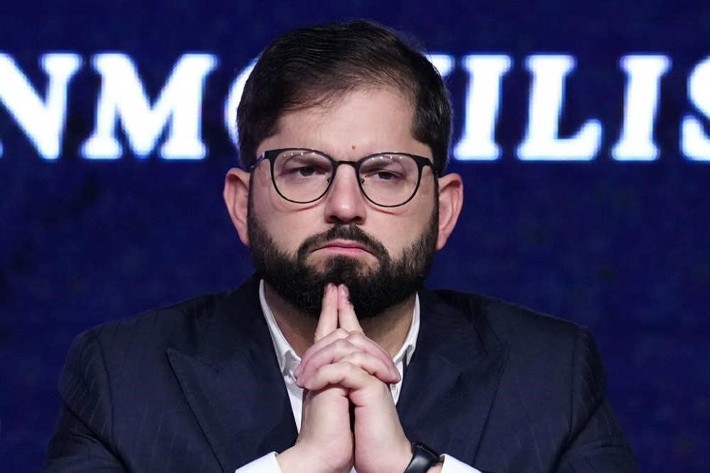 FILE - Chile's President Gabriel Boric attends the inauguration of the annual National Meeting of Entrepreneurs in Santiago, Chile, April 25, 2024. (AP Photo/Esteban Felix, File)