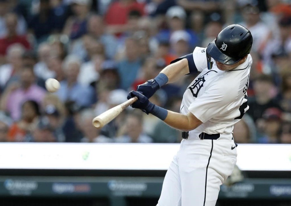 Detroit Tigers' Trey Sweeney hits a three-run home run against the Colorado Rockies during the first inning of a baseball game, Wednesday, Sept. 11, 2024, in Detroit. (AP Photo/Duane Burleson)