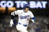 Los Angeles Dodgers' Shohei Ohtani runs to first as he grounds into a double play during the third inning of a baseball game against the Chicago Cubs, Tuesday, Sept. 10, 2024, in Los Angeles. (AP Photo/Mark J. Terrill)