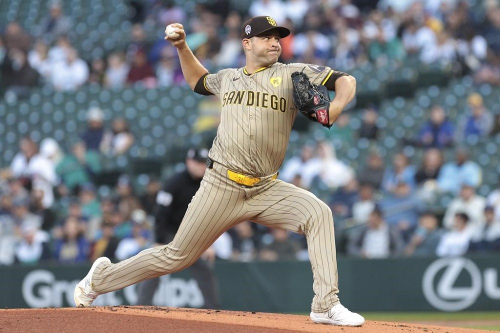 San Diego Padres starting pitcher Michael King throws during the first inning of a baseball game against the Seattle Mariners, Wednesday, Sept. 11, 2024, in Seattle. (AP Photo/Jason Redmond)