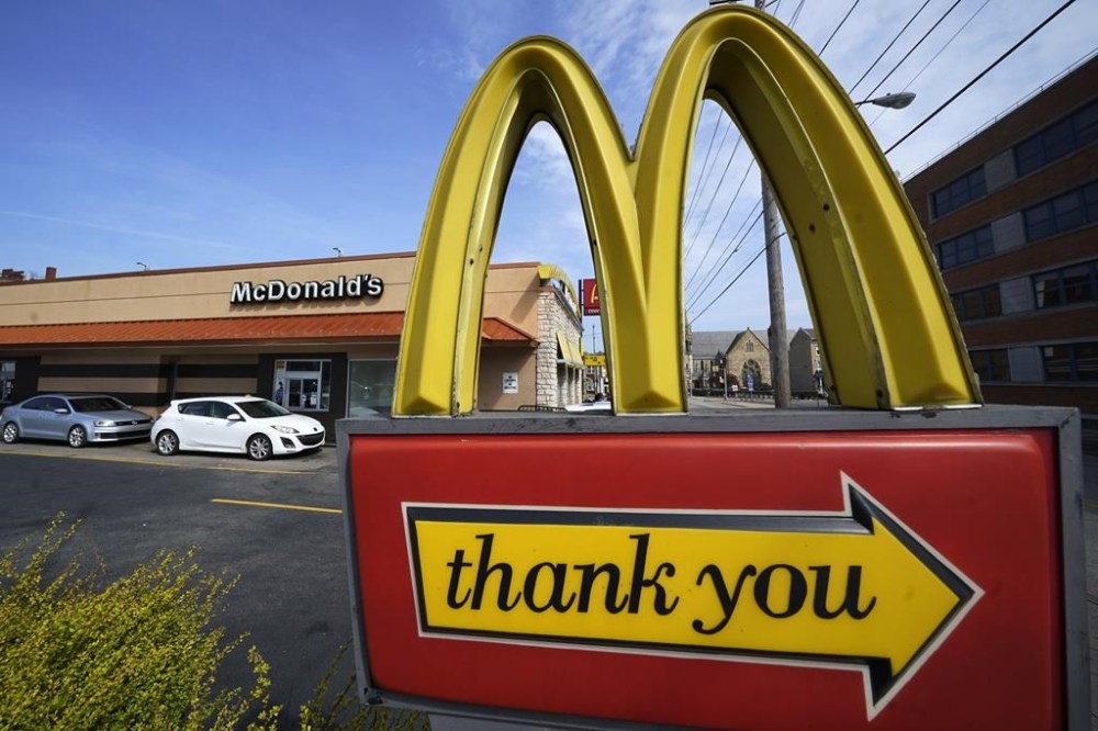 FILE - A sign is shown in front of an McDonald's restaurant in Pittsburgh on April 23, 2022. (AP Photo/Gene J. Puskar, File)